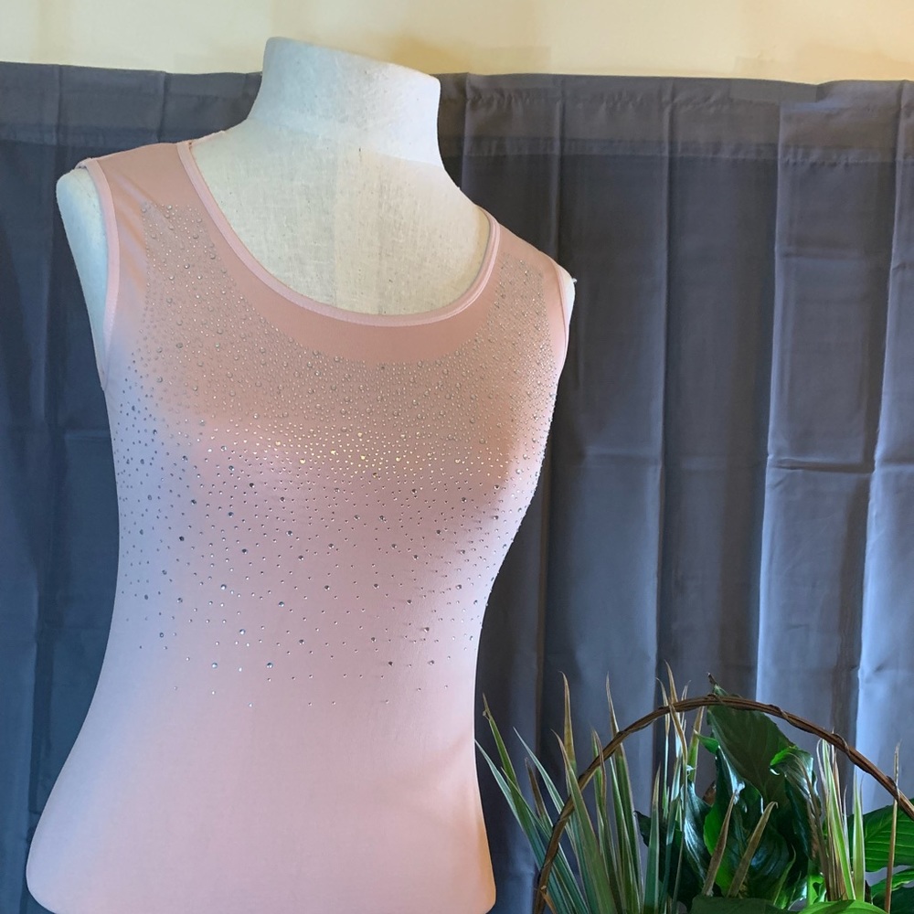LC Couture Spandex sleeveless top. Size medium, wear alone or with jacket